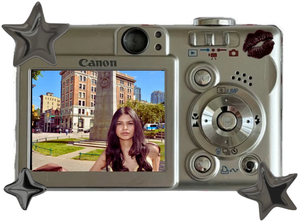 Pavni on the screen of a little silver camera